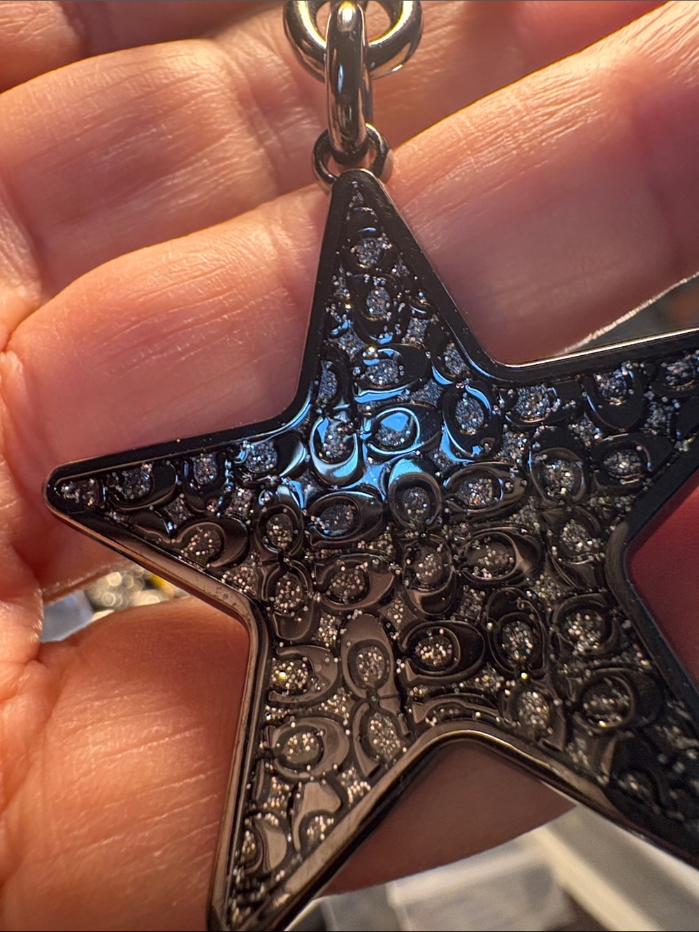 Coach Gun Metal Star Keychain Charm